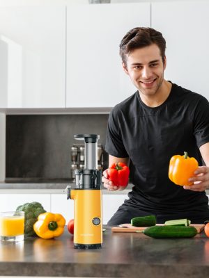 cheerful-young-man-filming-his-video-blog